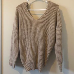 tan sweater with knotted back